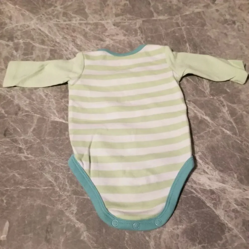 Carters long sleeve onesie size NB
